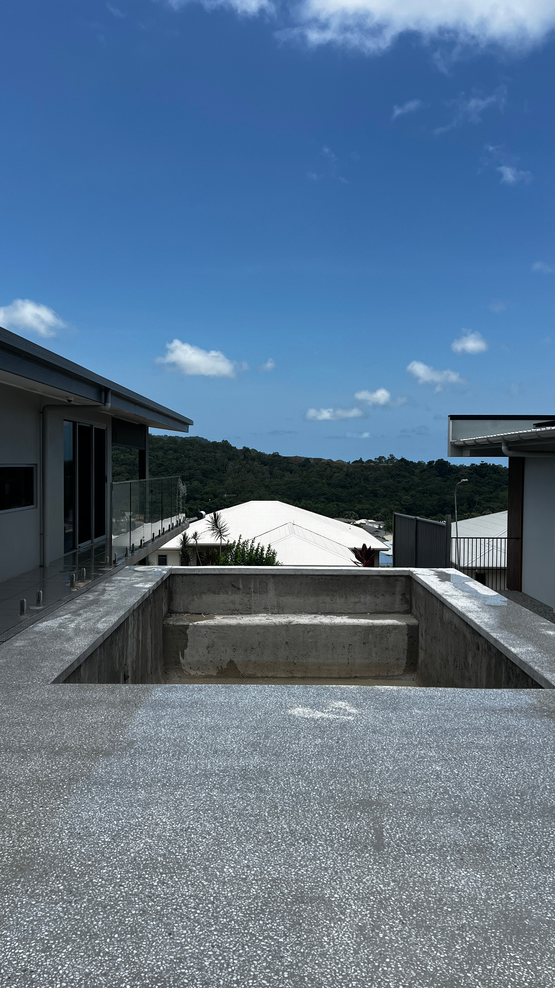 Concrete pool surround after pressure wash