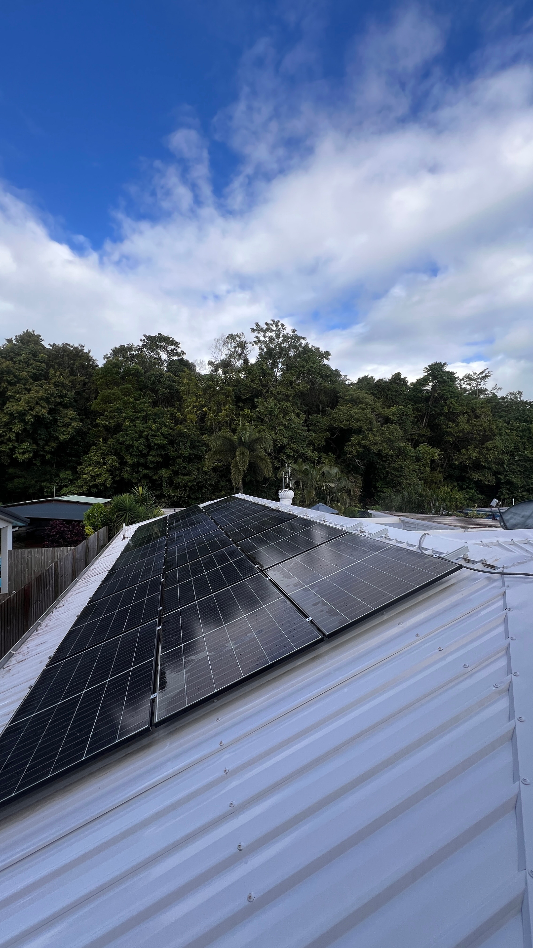 Solar panels on a freshly cleaned white roof